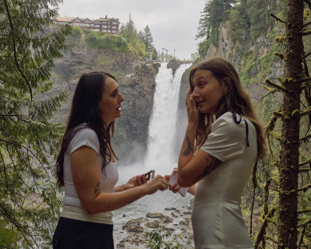 Two brides exchange vows in front of Snoqualmie Falls