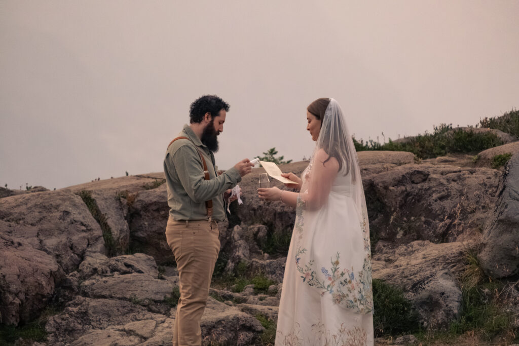 bride and groom perform a glass bead ceremony