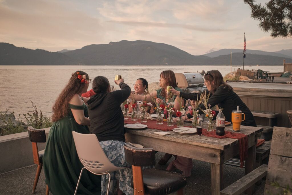 friends toast at dinner
